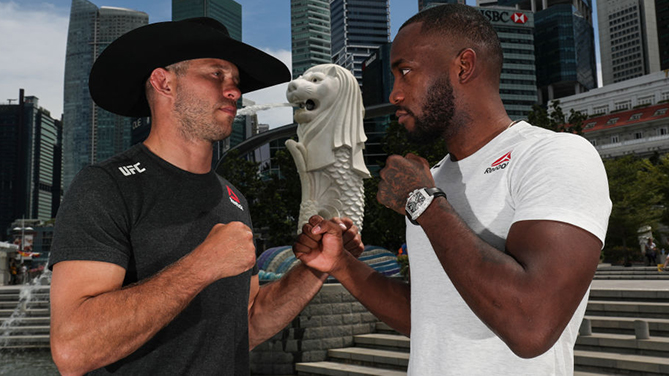 <a href='../fighter/Donald-Cerrone'>Donald Cerrone</a> (L) and <a href='../fighter/leon-edwards'>Leon Edwards</a> pose for a photo at the Merlion Park, overlooking the financial district, on April 25, 2018 in Singapore. (Photo by Yong Teck Lim/Zuffa LLC)