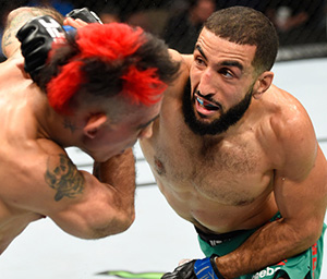 Belal Muhammad punches <a href='../fighter/augusto-montano'><a href='../fighter/augusto-montano'>Augusto Montano</a></a> of Mexico in their welterweight bout during the <a href='../event/UFC-Silva-vs-Irvin'><a href='../event/UFC-Silva-vs-Irvin'>UFC Fight Night </a></a>event at State Farm Arena on September 17, 2016 in Hidalgo, Texas. (Photo by Josh Hedges/Zuffa LLC)
