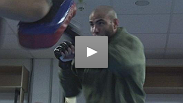 Saunders and Fisher hit pads before their fights.