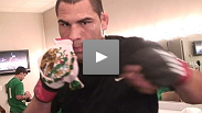 Cain Velasquez warms up before his fight against Jake O'Brien