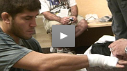 Cote, Lytle, Almeida get their hand wrapped before their fight.
