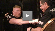 Brock Lesnar gets his hands wrapped before before his title fight