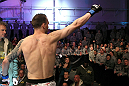 George Roop enters the octagon.