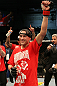 Mark Hominick celebrates his victory over George Roop.