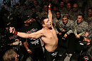 Matt Mitrione enters the arena.