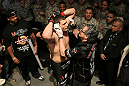 Matt Mitrione enters the arena.