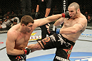 (L)Mitrione vs. (R)Hague