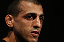George Sotiropoulos talks to the media during an Open Workout
