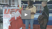 GSP gets his first look at the cover of the new magazine when hockey legend Georges Laraque surprises him at the gym.