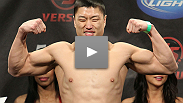 An extremely happy Dongi Yang earns his first win in the Octagon by sticking to what he knows best.