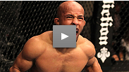 Here he comes to save the day... Demetrious "Mighty Mouse" Johnson shows off his impressive grappling skills with a third-round submission of Damacio Page.