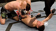 Nate Diaz locks in a killer triangle choke, then seals it with his signature Stockton salute.
