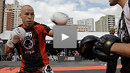 Former champions and future superstars thrill the fans at UFC 147 open workouts on the beach in Brazil.