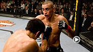 Terry Etim overcomes a broken nose to lock in a d'arce choke against Justin Buchholz at UFC 99.