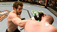 Nate Marquardt battles back from a nasty cut to finish Jeremy Horn with a guillotine choke at UFC 81.
