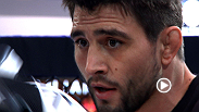 Former interim welterweight champion Carlos Condit interacts with fans and hits pads at the UFC 158 open workouts.