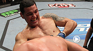 With only seconds left in the round, Chris Weidman uses a standing guillotine choke to submit Jesse Bongfeldt at UFC 131.