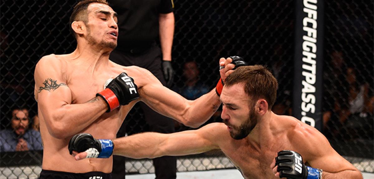 Ferguson survives scare, Boetsch wins