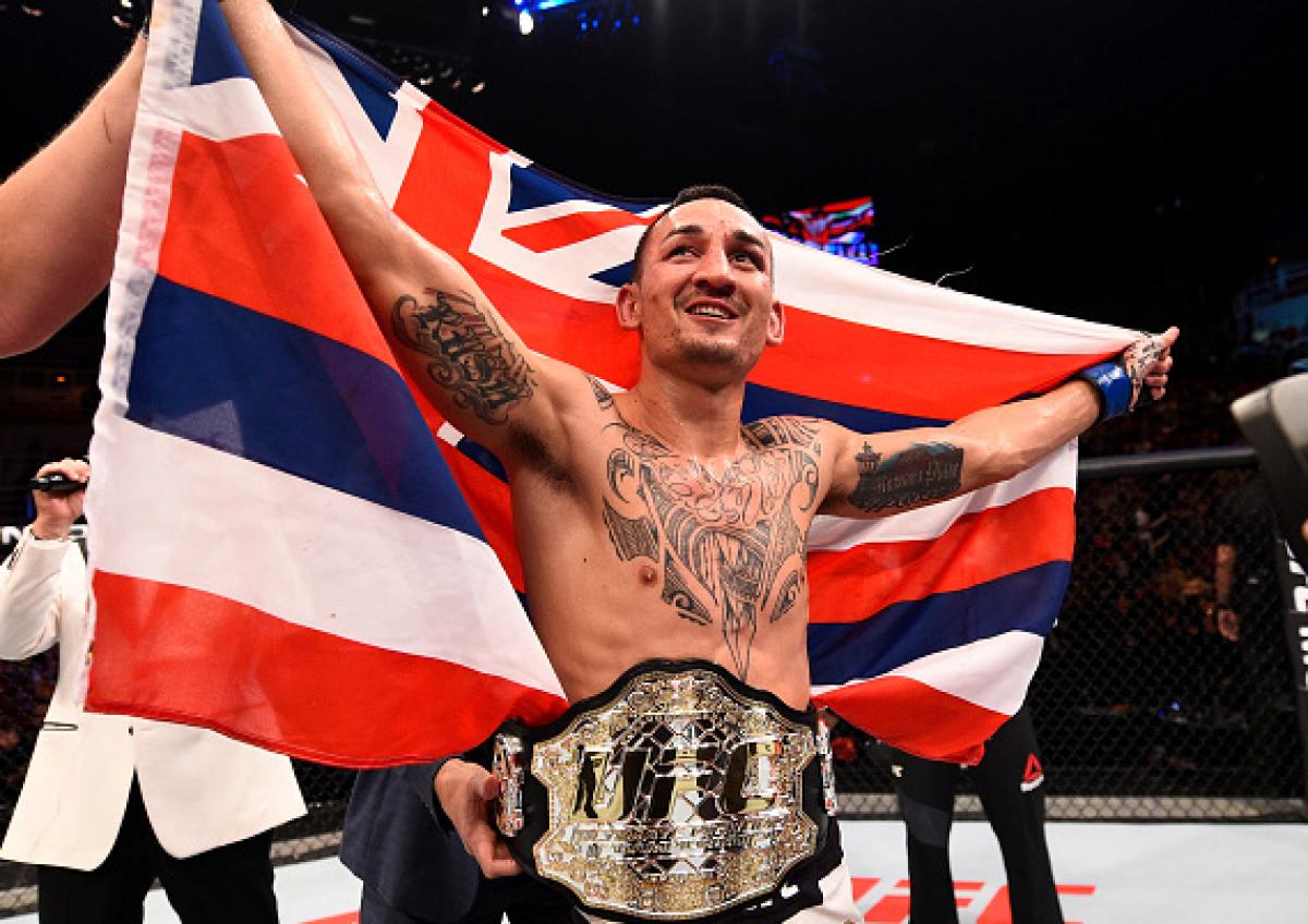 Holloway becomes undisputed champ, TKO's Aldo