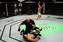 Rafael Dos Anjos celebrates after knocking out George Sotiropoulos.