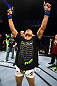 Rafael Dos Anjos celebrates after knocking out George Sotiropoulos.