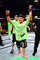 Dennis Siver celebrates his win by unanimous decision over Matt Wiman