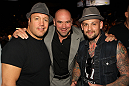 UFC President Dana White (center) poses for a photo with actor Kevin James (L) and musician Benji Madden (R) Octagonside.