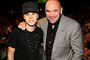 (L-R) Singer Justin Bieber and UFC President Dana White poses for a photo Octagonside at UFC 132.