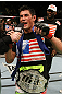 Dominick Cruz celebrates his win.