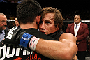 Dominick Cruz and Urijah Faber after the main event fight.