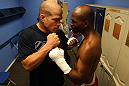 (R-L) World Champion boxer Bernard Hopkins and former UFC champion Tito Ortiz pose for a photo in the locker room at the Joe Hand Gym