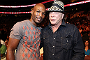 UFC 133: (L-R) Boxing champion Bernard Hopkins and actor Mickey Rourke pose for a photo octagonside at UFC 133.