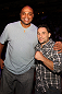 UFC 133: Director Stephen Sebring and designer Reed Krakoff pose for a photo octagonside.