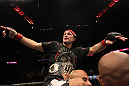 Frankie Edgar celebrates his win