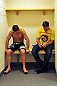 A disappointed Steve Cantwell sis in a corner in his dressing room with teammate Stephan Bonnar after his loss to Mike Massenzio