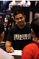Mark Munoz signs autographs for fans