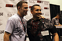 Jake Shields poses for a photo for a fan