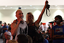 Jason "Mayhem" Miller poses with a fan during the Q&A