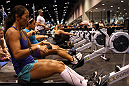 Athletes compete in the CrossFit competition at the UFC Fan Expo