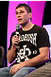 UFC fighter Amir Sadollah attends a Q&A session with former cast members of The Ultimate Fighter on the main stage at the UFC Fan Expo