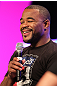 UFC fighter Rashad Evans attends a Q&A session with former cast members of The Ultimate Fighter on the main stage at the UFC Fan Expo