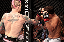 Tyson Griffin (white trunks) vs Bart Palaszewski (black trunks)