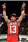 Chris Cariaso celebrates his win