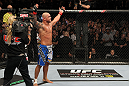 Thiago Alves celebrates his win