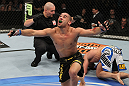 Renan Barao celebrates his win over Brad Pickett