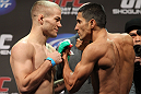 SAN JOSE, CA - NOVEMBER 18:  (L-R) Bantamweight opponents Michael MacDonald and Alex Soto face off after weighing in during the UFC 139 Weigh In at the HP Pavilion on November 18, 2011 in San Jose, California.  (Photo by Josh Hedges/Zuffa LLC/Zuffa LLC via Getty Images)