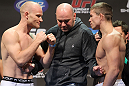 SAN JOSE, CA - NOVEMBER 18:  (L-R) Welterweight opponents Martin Kampmann and Rick Story are separated by UFC president Dana White as they face off after weighing in during the UFC 139 Weigh In at the HP Pavilion on November 18, 2011 in San Jose, California.  (Photo by Josh Hedges/Zuffa LLC/Zuffa LLC via Getty Images)