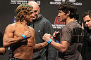 SAN JOSE, CA - NOVEMBER 18:  (L-R) Bantamweight opponents Urijah Faber and Brian Bowles face off after weighing in during the UFC 139 Weigh In at the HP Pavilion on November 18, 2011 in San Jose, California.  (Photo by Josh Hedges/Zuffa LLC/Zuffa LLC via Getty Images)