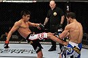SAN JOSE, CA - NOVEMBER 19: (L-R) Miguel Torres kicks Nick Pace during an UFC Bantamweight bout at the HP Pavillion in San Jose, California on November 19, 2011 in San Jose, California.  (Photo by Josh Hedges/Zuffa LLC/Zuffa LLC via Getty Images)