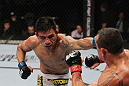 SAN JOSE, CA - NOVEMBER 19: (L-R) Rafael dos Anjos punches Gleison Tibau during an UFC Lightweight bout at the HP Pavilion in San Jose, California on November 19, 2011 in San Jose, California. (Photo by Josh Hedges/Zuffa LLC/Zuffa LLC via Getty Images)